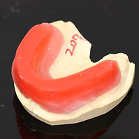 Bite block for a full denture