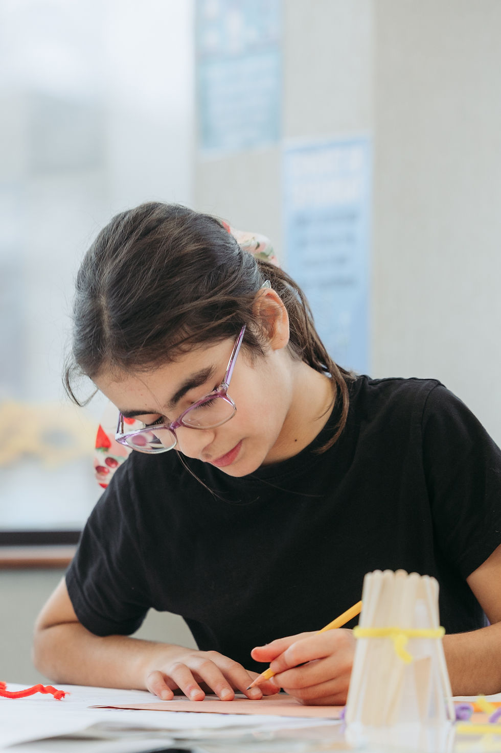 Girl doing tasks in class