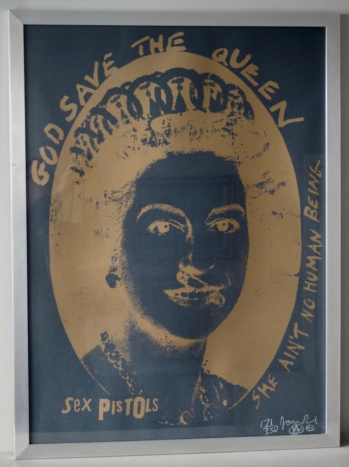 Sex Pistols..God Save The Queen...signed by Jamie Reid.