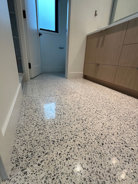 Modern bathroom with polished concrete floor