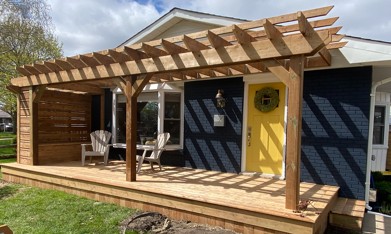 Front porch with pergola and privacy bench_edited.png