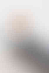 Macbook with a croissant on a plate