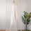 Thumbnail: Boho bridal dress displayed at Enso Brautkleider bridal boutique Dietikon back