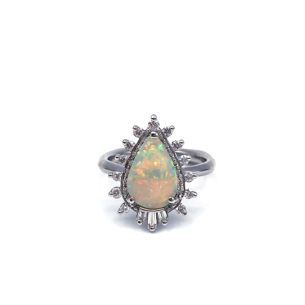 Custom Opal Engagement Ring with Diamond Halo and Baguette Diamond Tail feathers in Platinum; Heirloom Opal Redesign