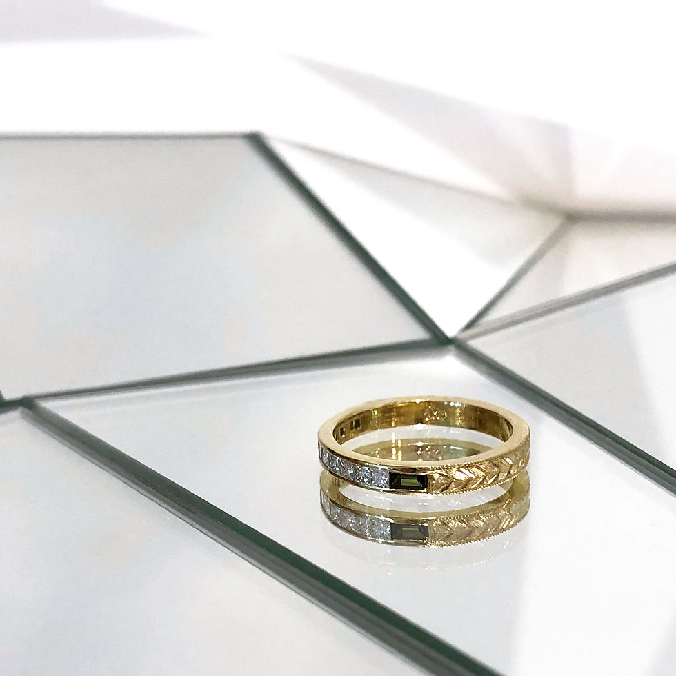 Thumbnail: Bespoke Princess Cut Diamond and Green Tourmaline Baguette Channel Set Ring with Modern Wheat Pattern Engraving in 18k