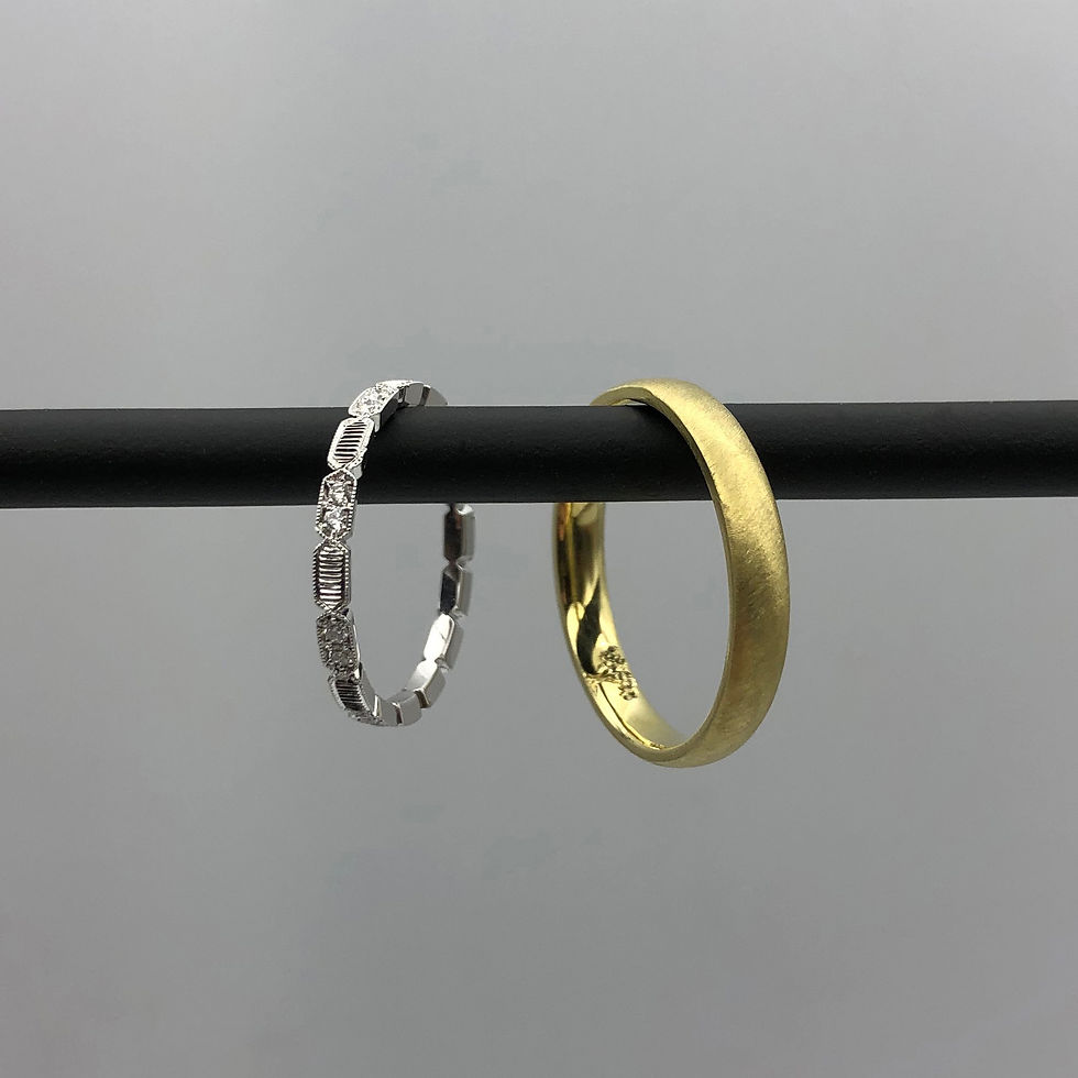 Thumbnail: Custom Diamond Eternity Band in Platinum with Engraving Detail with Custom Men's Wedding Band