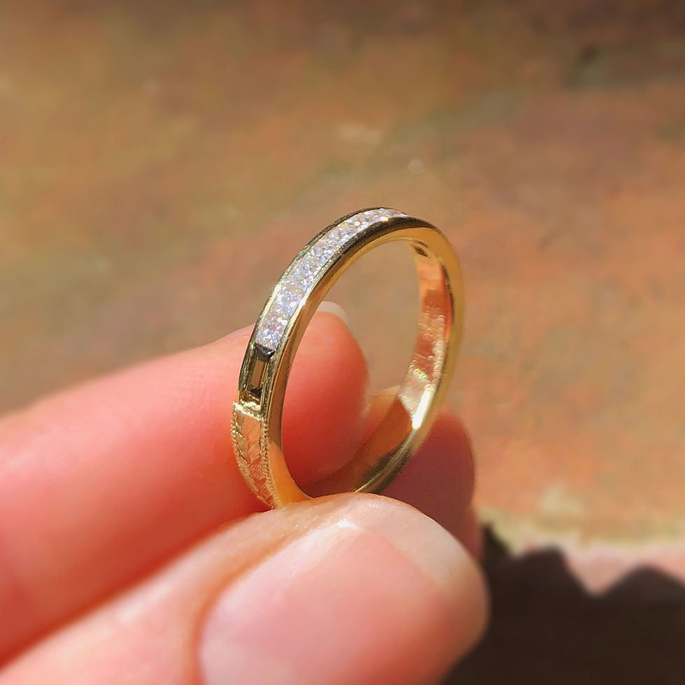 Thumbnail: Bespoke Princess Cut Diamond and Green Tourmaline Baguette Channel Set Ring with Modern Wheat Pattern Engraving in 18k