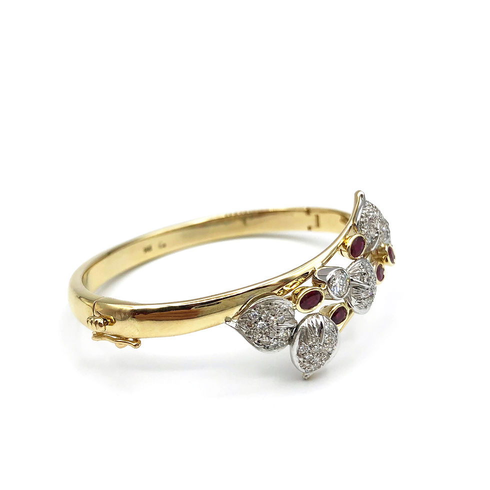 Thumbnail: Diamond and Ruby Cuff Bracelet Using Heirloom Diamond Pavé Leaves and Diamond