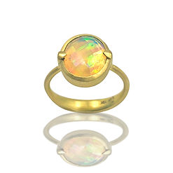 Faceted Ethiopian Opal Ring in 18kyg.jpeg