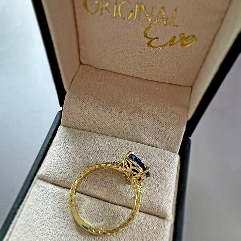 Thumbnail: Custom Sapphire Ring with Ornate Engraving and Diamond Detail in 18k Yellow Gold