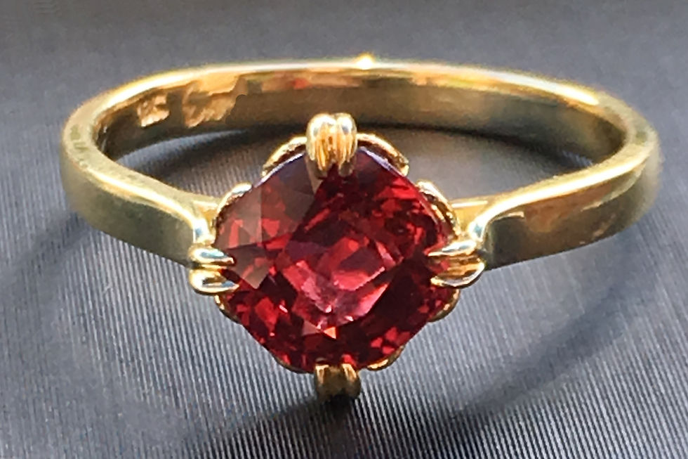 Thumbnail: Bespoke Cushion Cut Ruby Ring Set on Axis with Scroll Pattern Basket and Personalized Engraving in 18k Recycled Yellow Gold