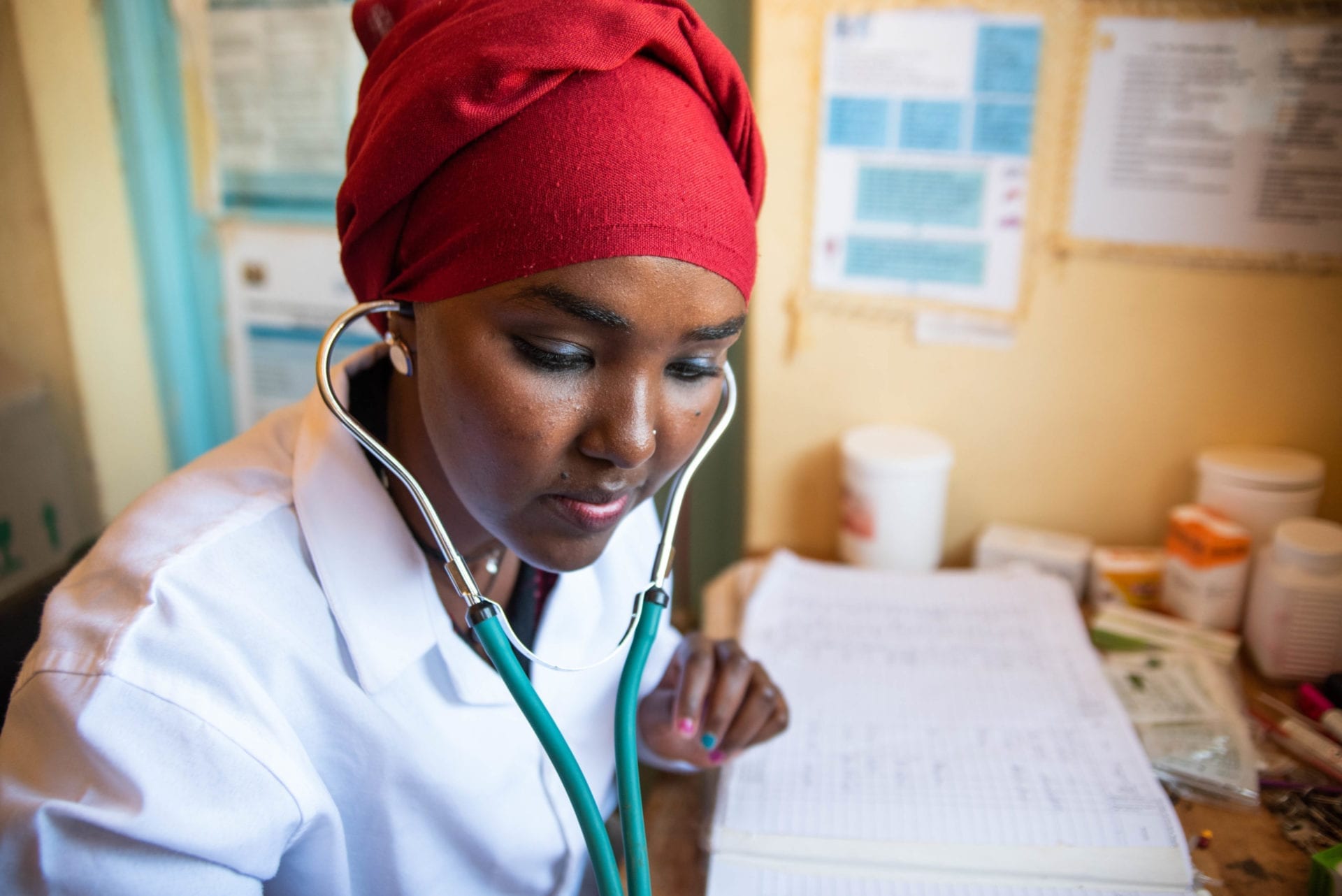 Loisaba’s Clinical Health Officer, Kaltuma Dabaso, assisting at the local dispensary. © Roshni Lodhia