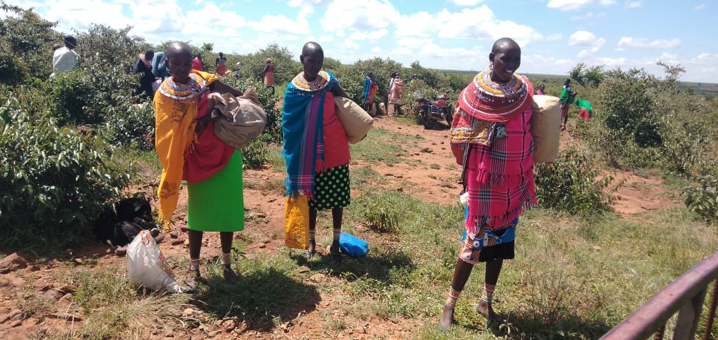 KMC community receiving food supplies.