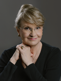 Cheri Pierson Yecke, PhD, author of Discovering Laura - The Historical Laura Ingalls Wilder, V. 1 & 2 and other books, has a distinguished career as an educator.