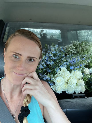 Selina Fowler buisness owner with custom flowers for client
