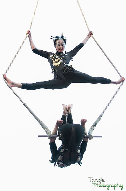 Doubles Trapeze Splits and Barrel Rolls