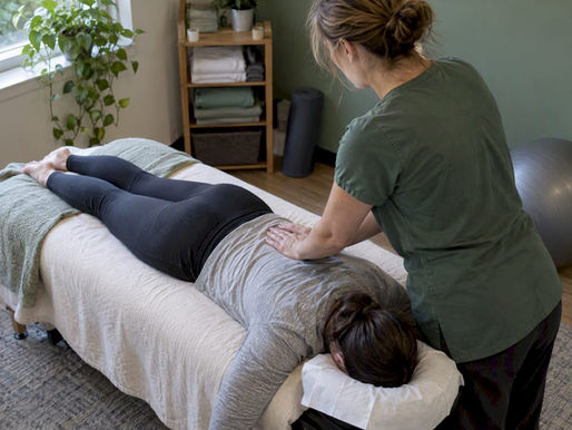 Therapist providing gentle craniosacral treatment