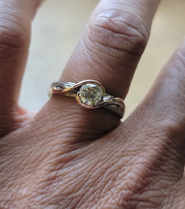 Thumbnail: Unique one of a kind engagement ring with wave on a mokume gane band