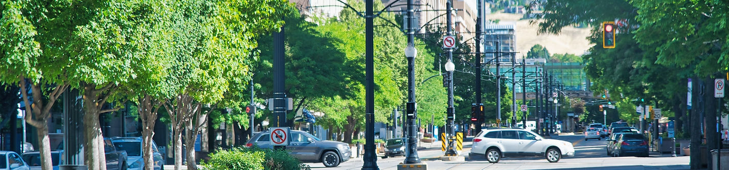cars traveling in downtown