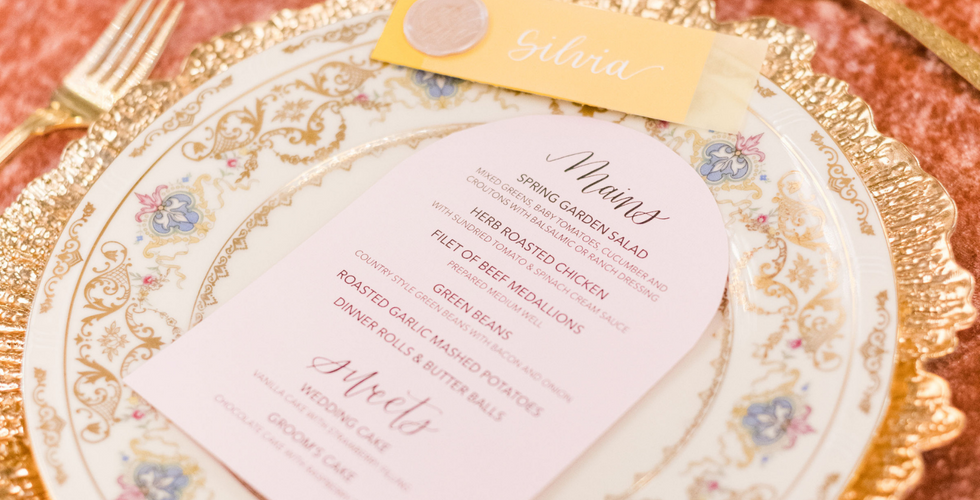 Romantic table setting with menu