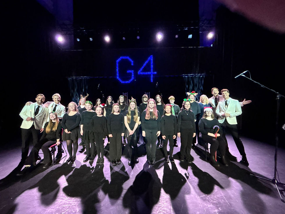 Glasgow Youth Choir Senior Choir on stage with G4