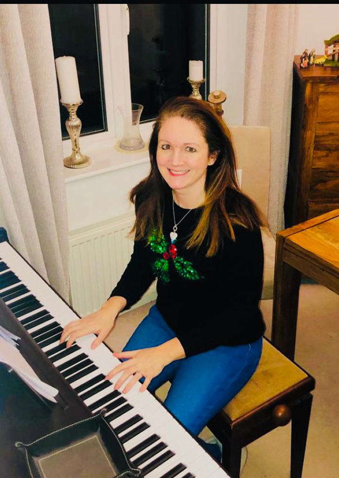Dr Fiona Gibney playing the piano