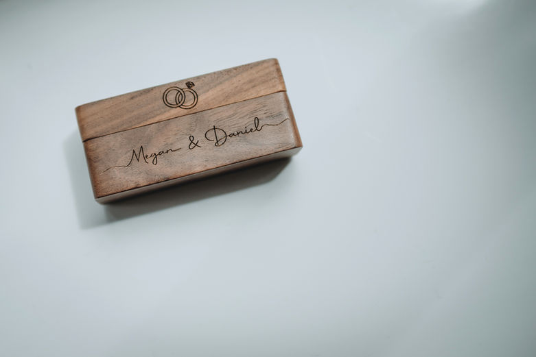 brown ring box with engraving 