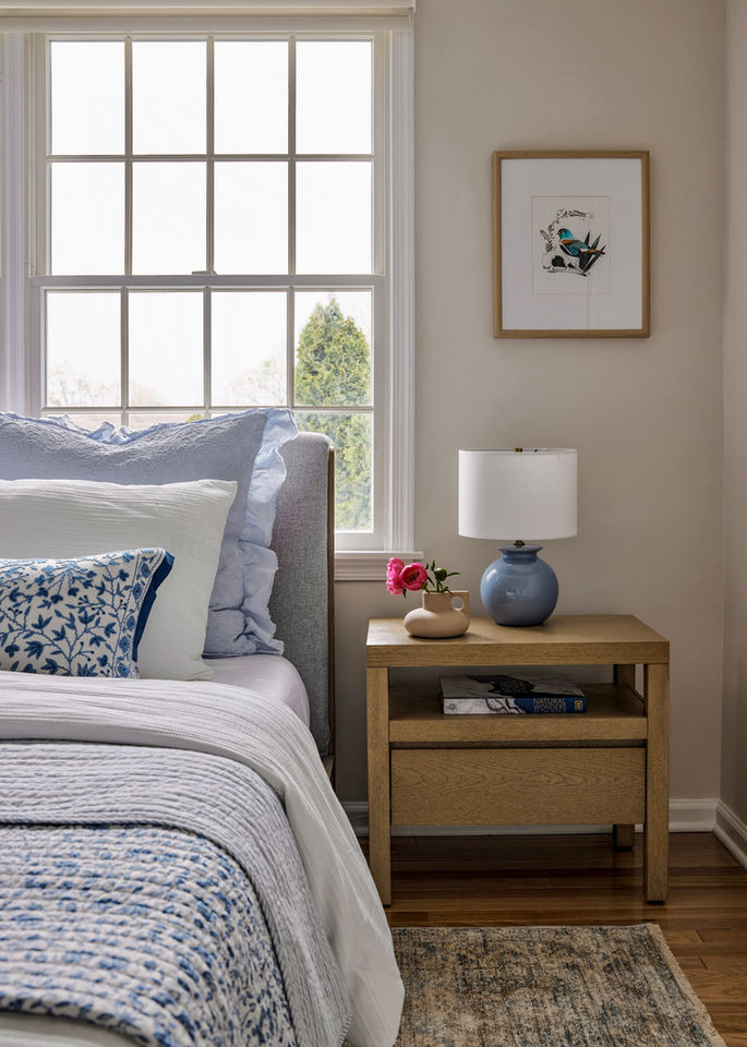 Guest bedroom with bed, nightstand, and lamp. West Orange, NJ