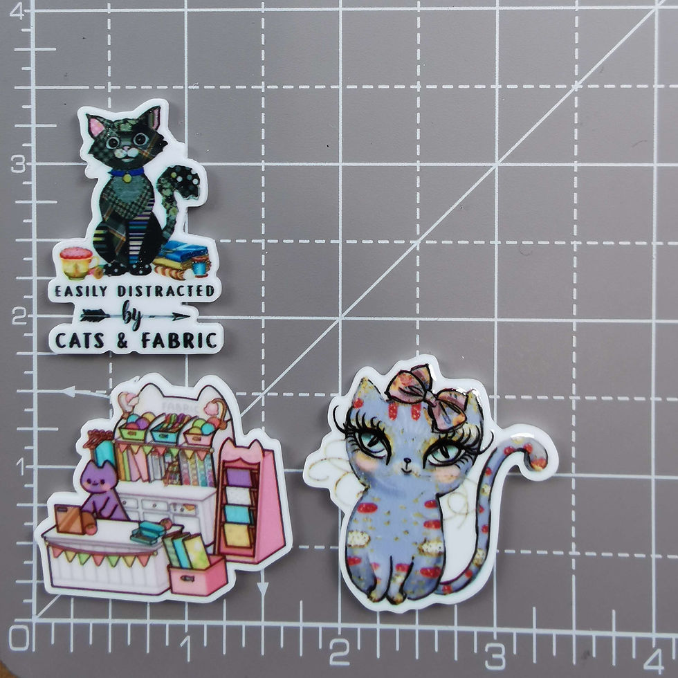 Thumbnail: Needle Minder - Kitty Fabric Store, Cats & Fabric, Colourful Kitty with Bow