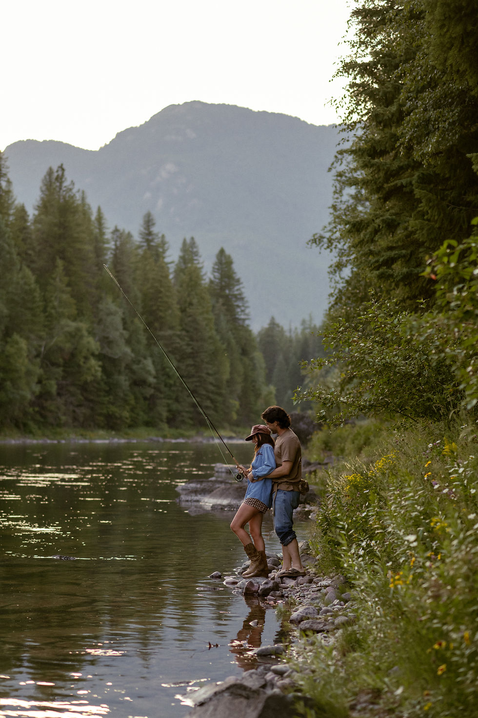 couples fishing photoshoot in whitefish, montana