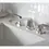 Thumbnail: Shiny chrome faucet with a white ceramic sink and tile background.