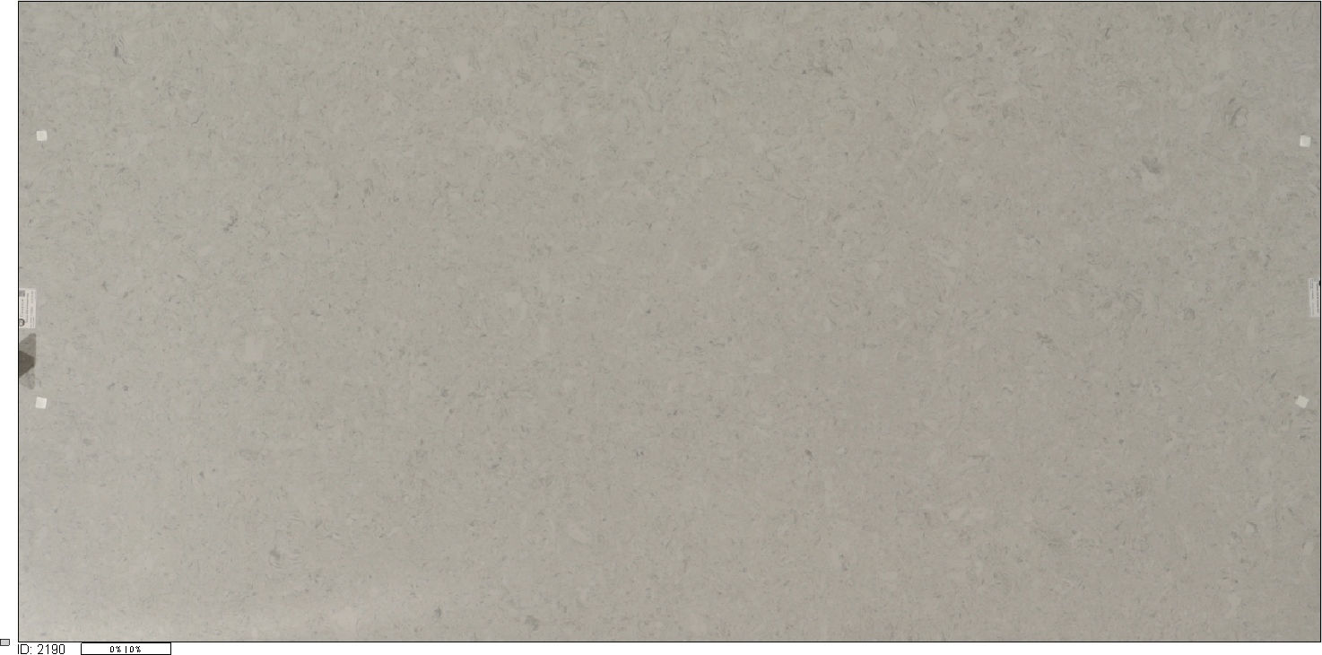 Rectangular, light-colored stone slab. Shadow Storm Marble adds texture and visual interest.