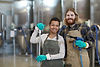 two-cleaning-workers-smiling-at-camera-2025-03-08-19-11-23-utc.jpg