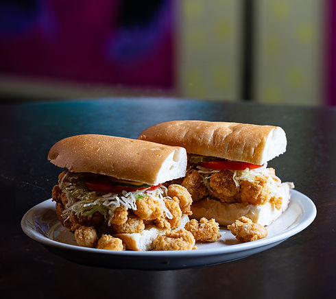 Fried chicken po' boy sandwich photographed for restaurant marketing