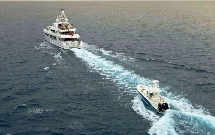 Large vessel towing tender vessel