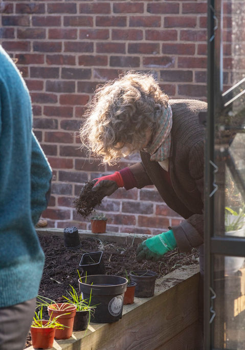 drawing of a person doing gardening