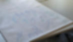 detail of some notes from a workshop with visible handwritten graphic circles and colors