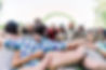 Workshop participants huddled in a circle.