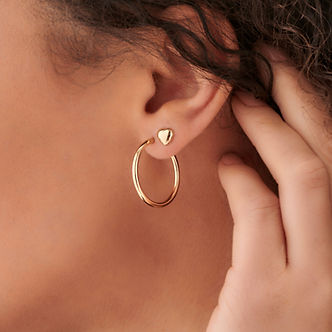 elements gold hoop earrings model.jpeg