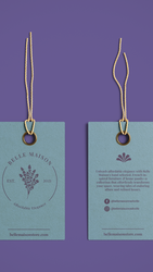 Two Belle Maison hang tags displayed front and back, attached with gold string. The design features delicate serif typography, botanical illustrations, and product care details.
McKenleigh Spitler | Packaging Design