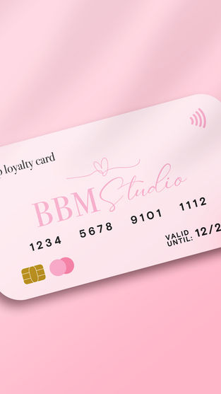 A close-up of a BBM Studio VIP loyalty card on a pink, satin-like fabric, showcasing elegant typography and soft gradients.
McKenleigh Spitler | Packaging Design