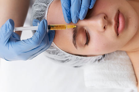 view-woman-getting-face-prp-treatment.jpg