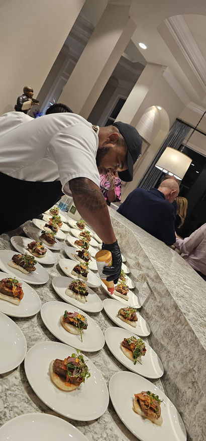 Chef plating appetizers for an event