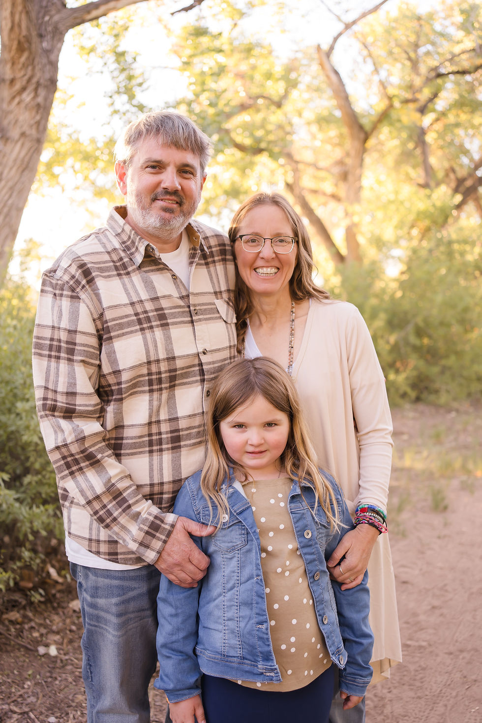 family smiling for camera