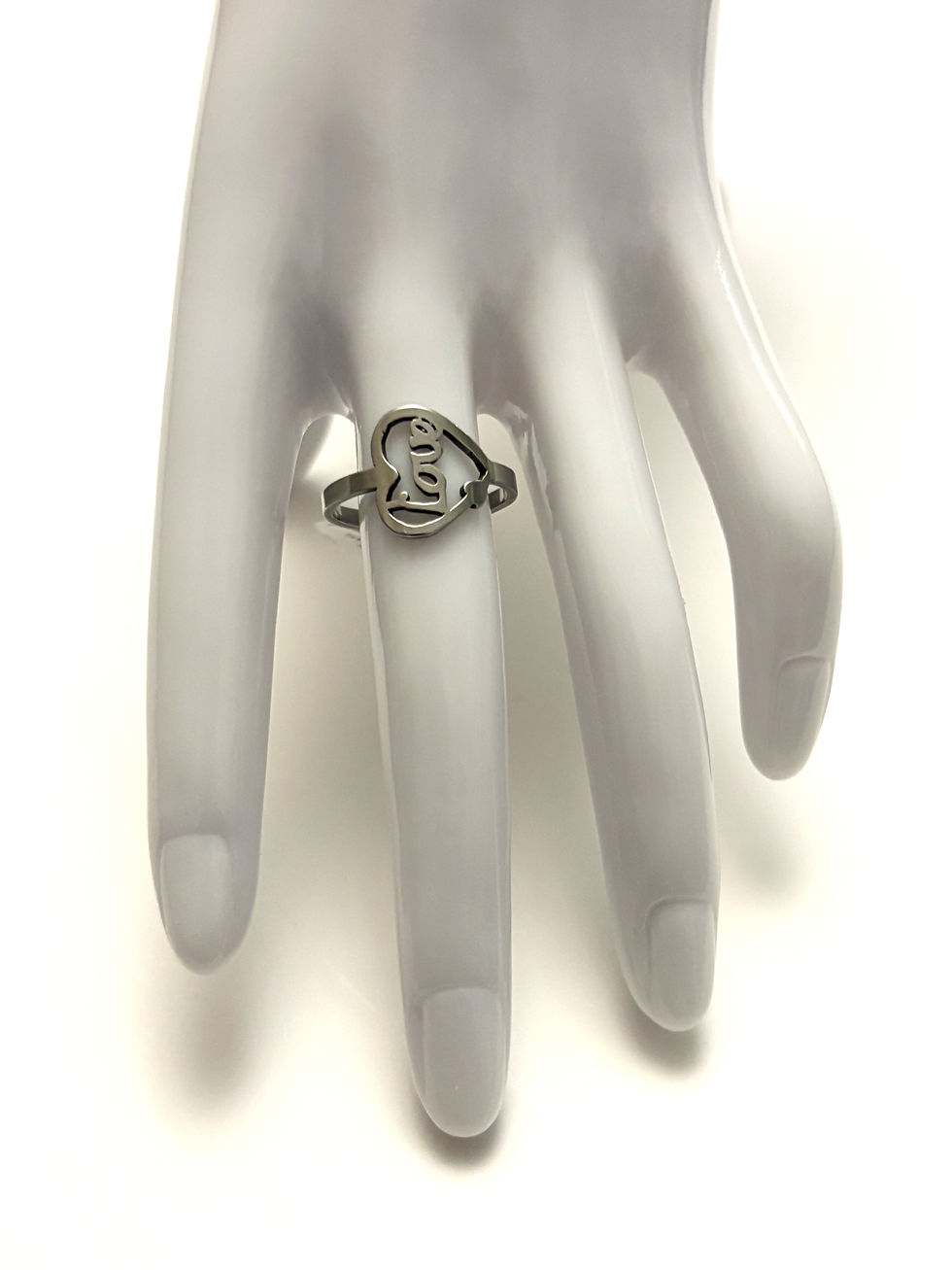 View of number 1 stainless steel ring on hand