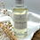Thumbnail: 100ml Black Pomegranate Reed Diffuser Refill. 100ml clear glass bottle with silver cap.