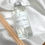 Thumbnail: Raspberry & Peppercorn 100ml Reed Diffuser Refill in a clear class bottle with silver cap.