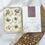 Thumbnail: 6 round shaped botanical wax melts in a luxury match style box in the scent wild mint a White Company scent.