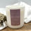 Thumbnail: Candle in a matte white vessel with purple label, scented in wild rhubarb and plum.