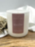 Wild Mint Scented Luxury Candle in a white matte vessel with purple label.
